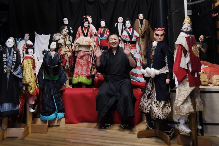 The puppet master, Yoshida Hironosuke, surrounded by Awaji puppets